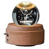 La caja de música está hecha de una bola de cristal real con base de madera de alta calidad.material resistente, diseño hermoso, precioso perfecta para cualquier colector craftsmanship- caja de música.Diámetro de la bola de cristal: 2,7 pulgadas (7 cm), esto significa que usted puede mantener los ciervos en la mano, muy delicado con tecnología exquisita talla 3D.