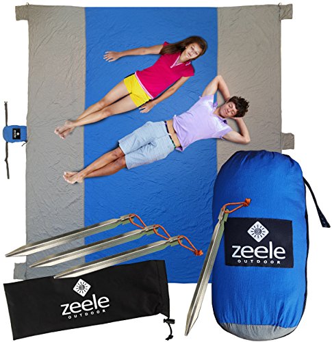 Sandproof Beach Blanket XL 10 x 9 - Great for Festivals, Camping, Picnics-Quick Dry Durable 210T Nylon, Water Resistant, 5 Pockets For Sand, 1 for Storage + 4 Anchor Loops & Quality Stakes