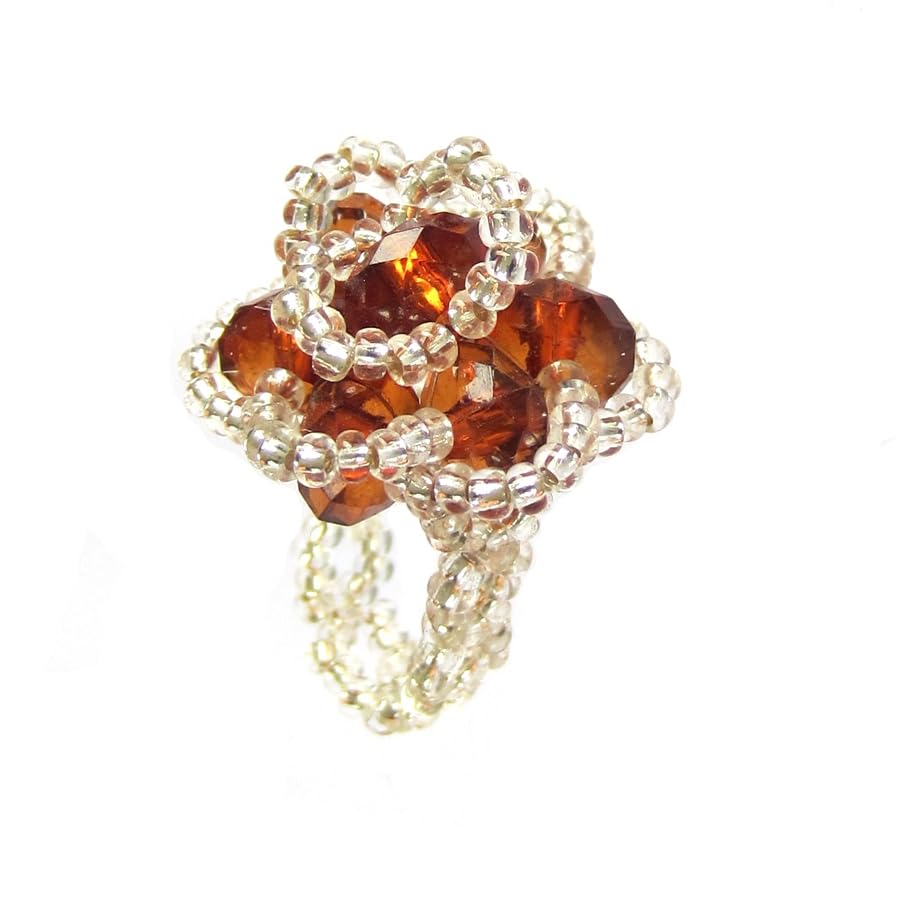 Bague perles marron et cristaux précieux d'une élégance unique