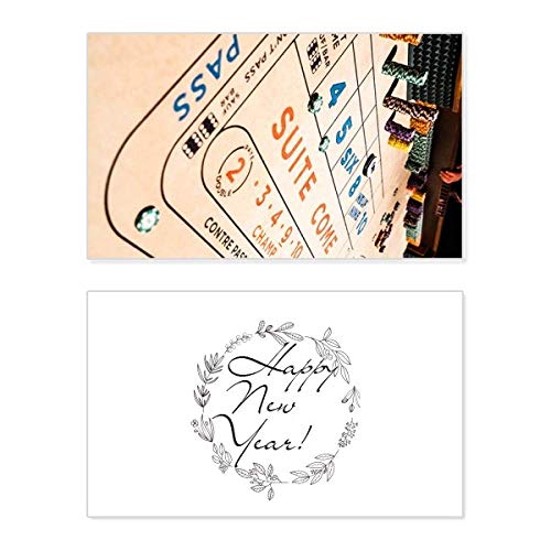 Tarjeta conmemorativa de Año Nuevo ideal para regalar en tus noches de juego familiares