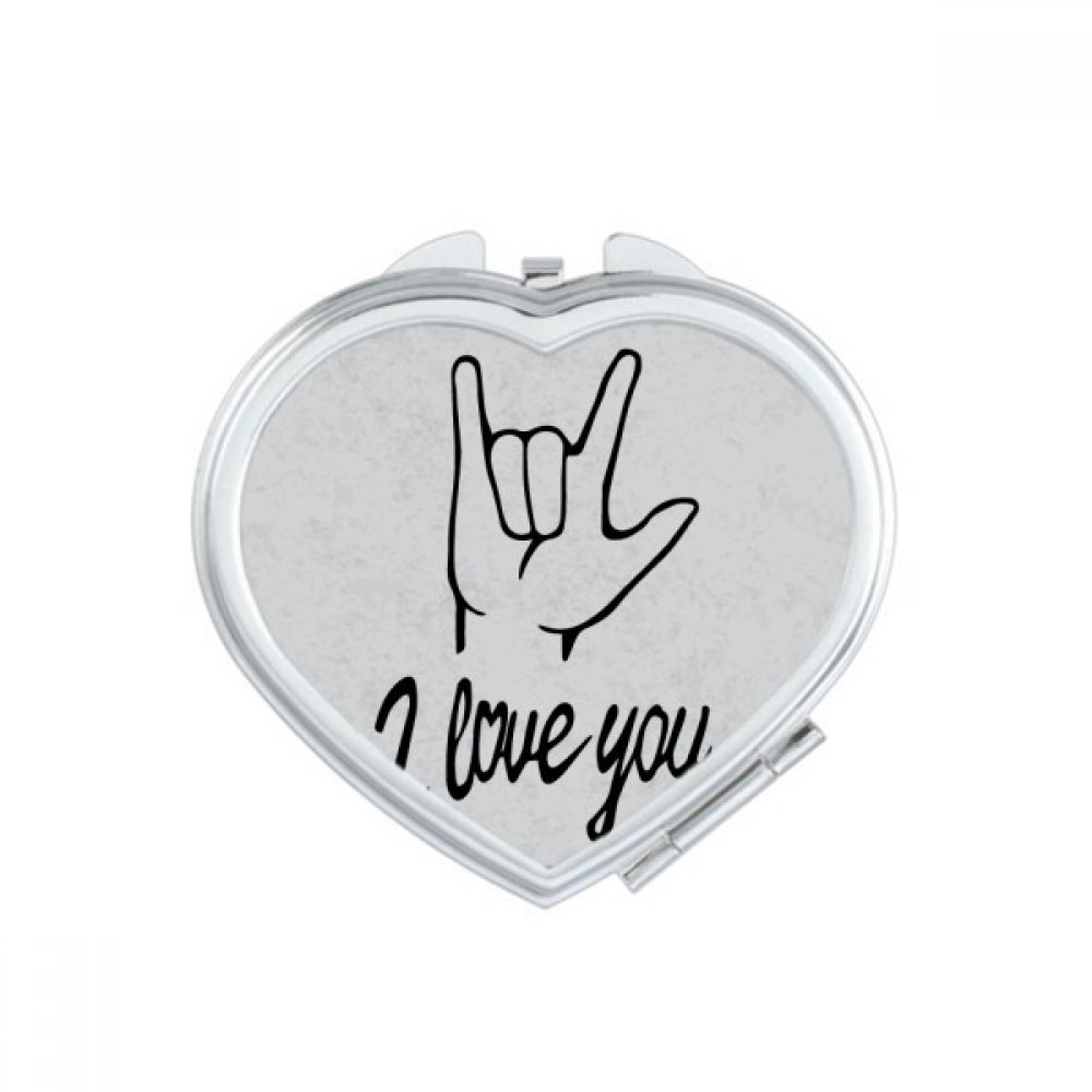 Miroir compact portable geste coeur pour vos retouches maquillage