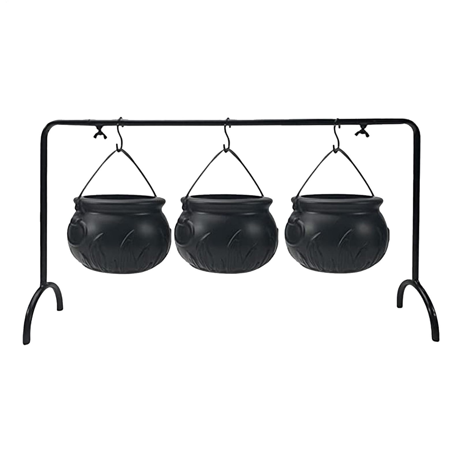 Caldero de brujas para dulces en decoración de mesa de comedor exterior
