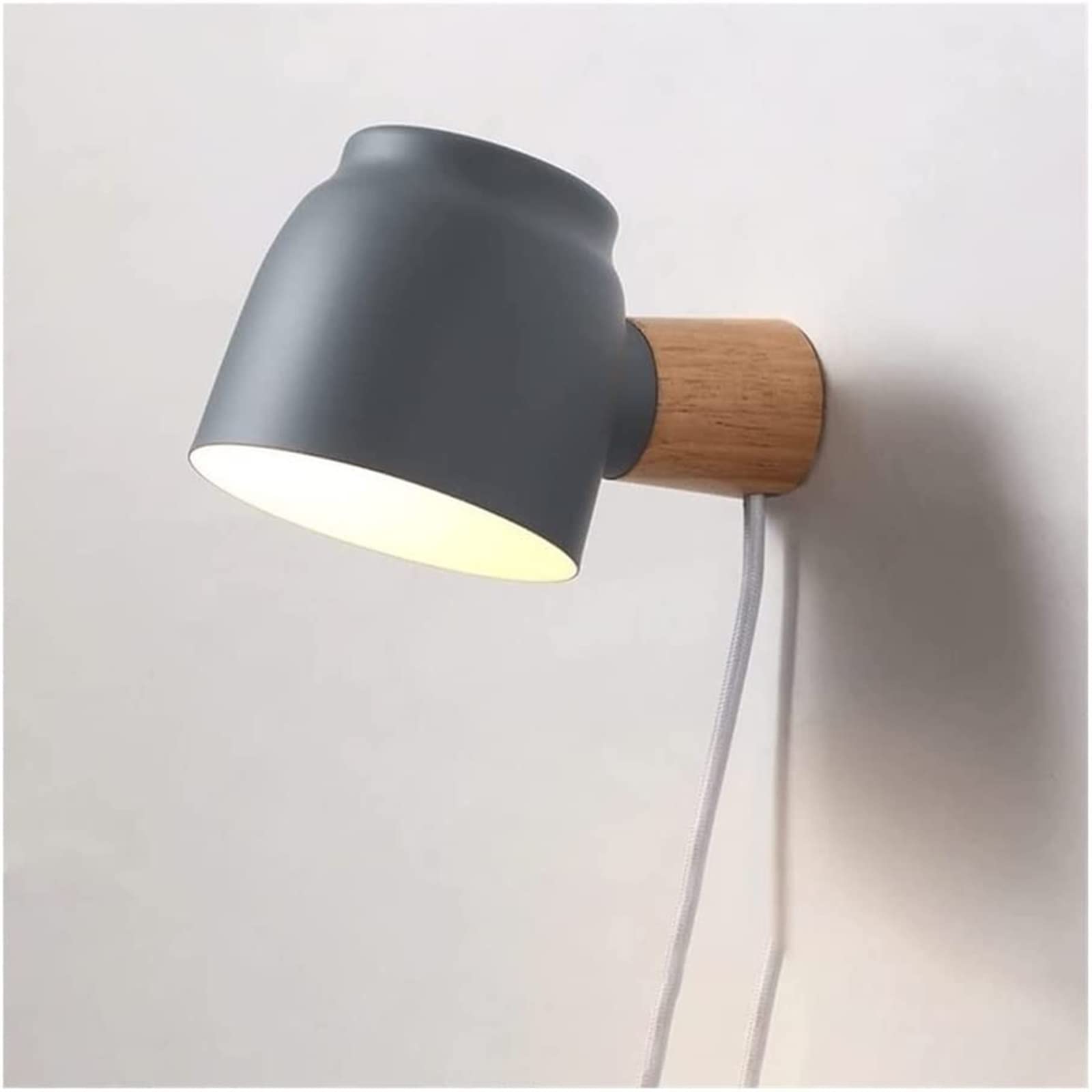 Lámpara de pared giratoria con foco LED orientable para una lectura cómoda en el dormitorio