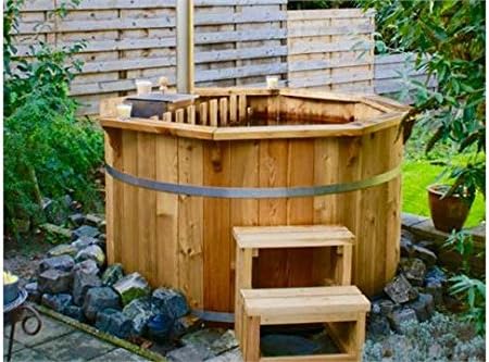 1.9m Spruce Hot Tub with Internal Burner Heater & Seating: Internal Stainless Steel Wood Burner Heater with Chimney; Stainless Steel Tightening Bands; Safety Fence; Benches Inside; Outlet Valve for Water; Stairs; Hose Connection Ready. Item Comes Flat Packed with Full Detailed Instructions for Assembly.