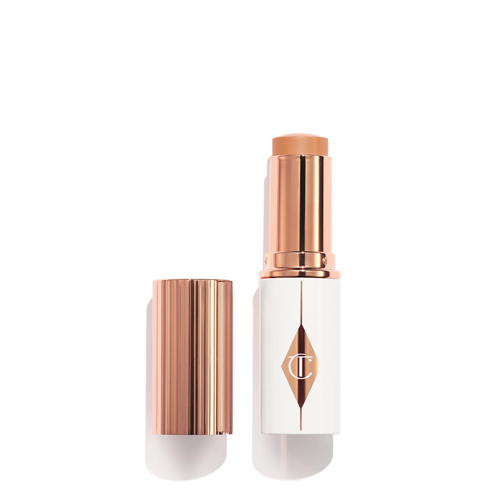Charlotte Tilbury Unreal Skin Tint Sheer Glow Hydrating Foundation Stick - Cream Foundation Makeup with Sheer-to-Light Coverage & a Buildable Formula - Blurring, Smoothing & Nourishing - 7 Medium