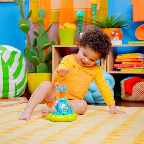 Bright Starts, 10042 Press & Glow Spinner, Musikspielzeug Kreisel mit blinkenden Lichtern und Melodien, fördert die Motorik und das Verstehen von Ursache und Wirkung, 19.05 x 17.78 x 21.59 cm