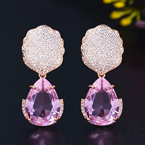 Boucles d'oreilles cristal rose aux bords biseautés longs et raffinés