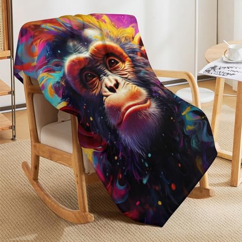 Couverture douce singe pour des soirées cocooning sur le canapé