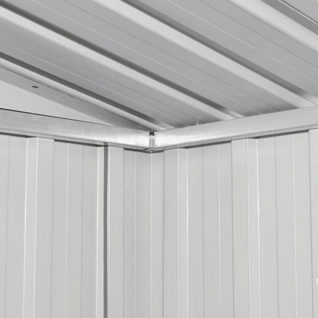 Interior view of the shed showing the galvanized steel roof and frame structure