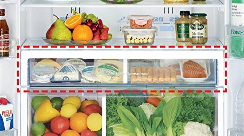 Close-up of the chilled compartment or multi-purpose drawer inside the refrigerator, containing various dairy products and packaged foods.