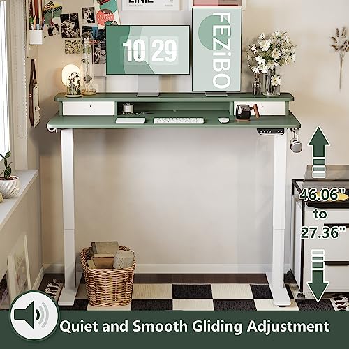 Image of FEZIBO 60 x 24 Inch Height Adjustable Electric Standing Desk with Double Drawer, Stand Up Desk with Storage Shelf, Sit Stand Desk, Green