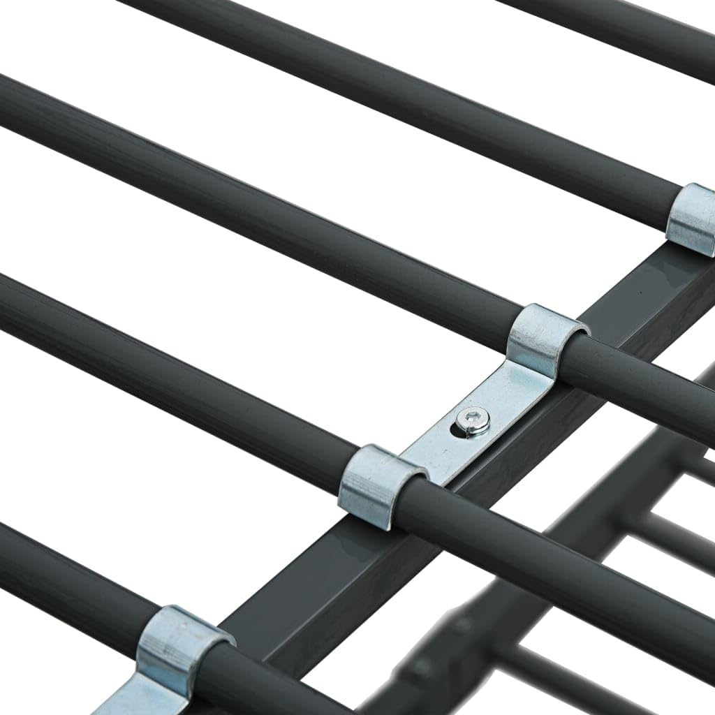 Close-up of the metal bed slats and their attachment clips to the frame.