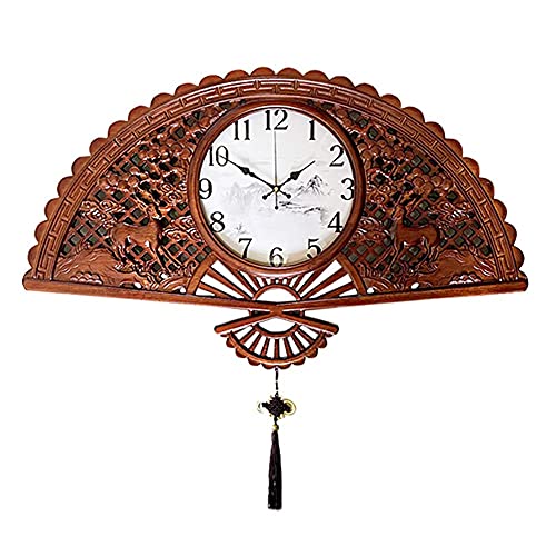 Horloge murale chinoise XJBTBA en métal noir au design ajouré