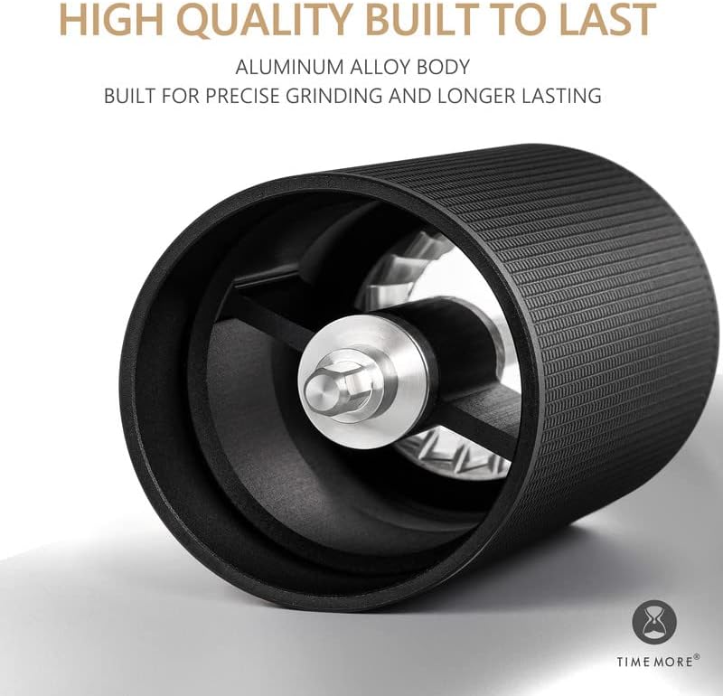 Hand adjusting the internal grind setting dial on the TIMEMORE C3 ESP coffee grinder.