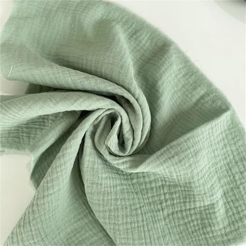 Tissu etamine de coton vert sauge pre-froisse pour eviter le repassage de vos chemins de table