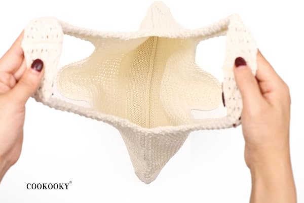 Close-up of the COOKOOKY Crochet Beach Tote's open weave and sturdy handle construction.