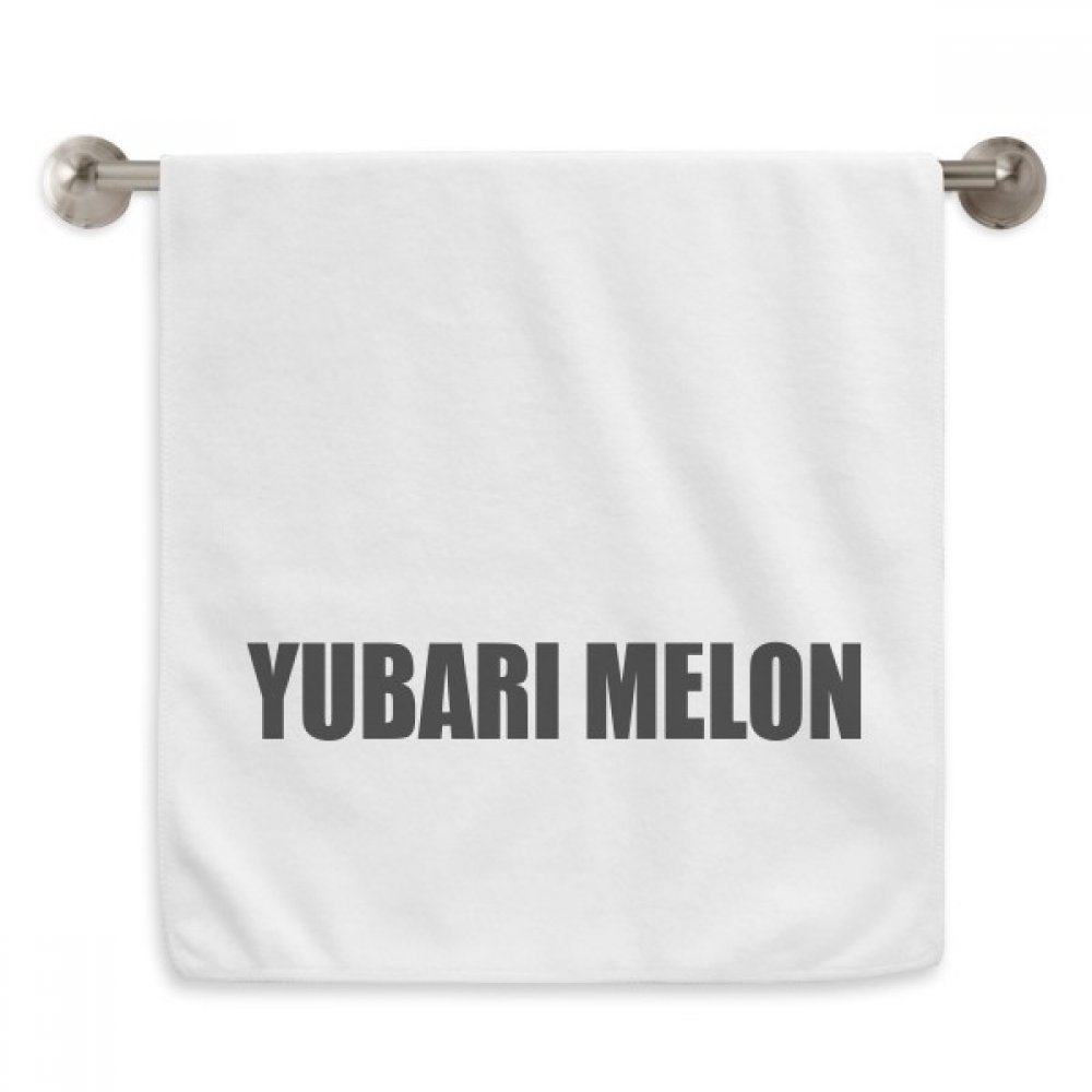 Serviette Yubari Melon 13x29 pouces blanche en tissu moelleux pour le visage