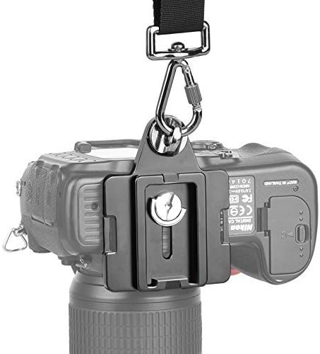Camera with quick release plate and wrist strap attached