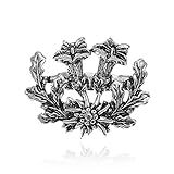 Die traditionelle Edelweiß und Enzian Brosche könnte schon demnächst deinen Janker oder deinen Wies'n Hut zieren. Ein Muss für das Oktoberfest!