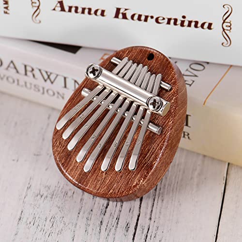 Qianderer Mini piano à pouce 8 touches Kalimba avec cordons, cadeau de Noël pour la famille, marron - Les Beatles, Paul McCartney, John Lennon, RIngo Starr, George Harrison Qianderer Mini piano à pouce 8 touches Kalimba avec cordons, cadeau de Noël pour la famille, marron – Image 3