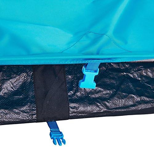 Close-up of a blue buckle on the Quechua tent, used for securing components.