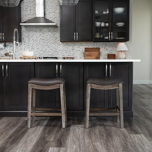 Image of Maven Lane Adrien Backless Counter Stool - Set of 3 - 26 Inches - Saddle Stool with Footrest - Brown Solid Wood Frame & Dark Brown Faux Leather Upholstery - Perfect for Kitchen Islands & Counters