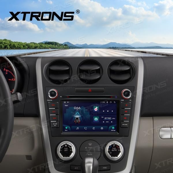 XTRONS IA72CX7M car radio installed in a Mazda CX7 dashboard.