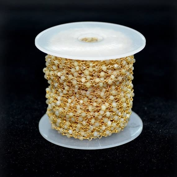 Chaîne opale jaune au mètre en fil plaqué or pour création collier perles style chapelet