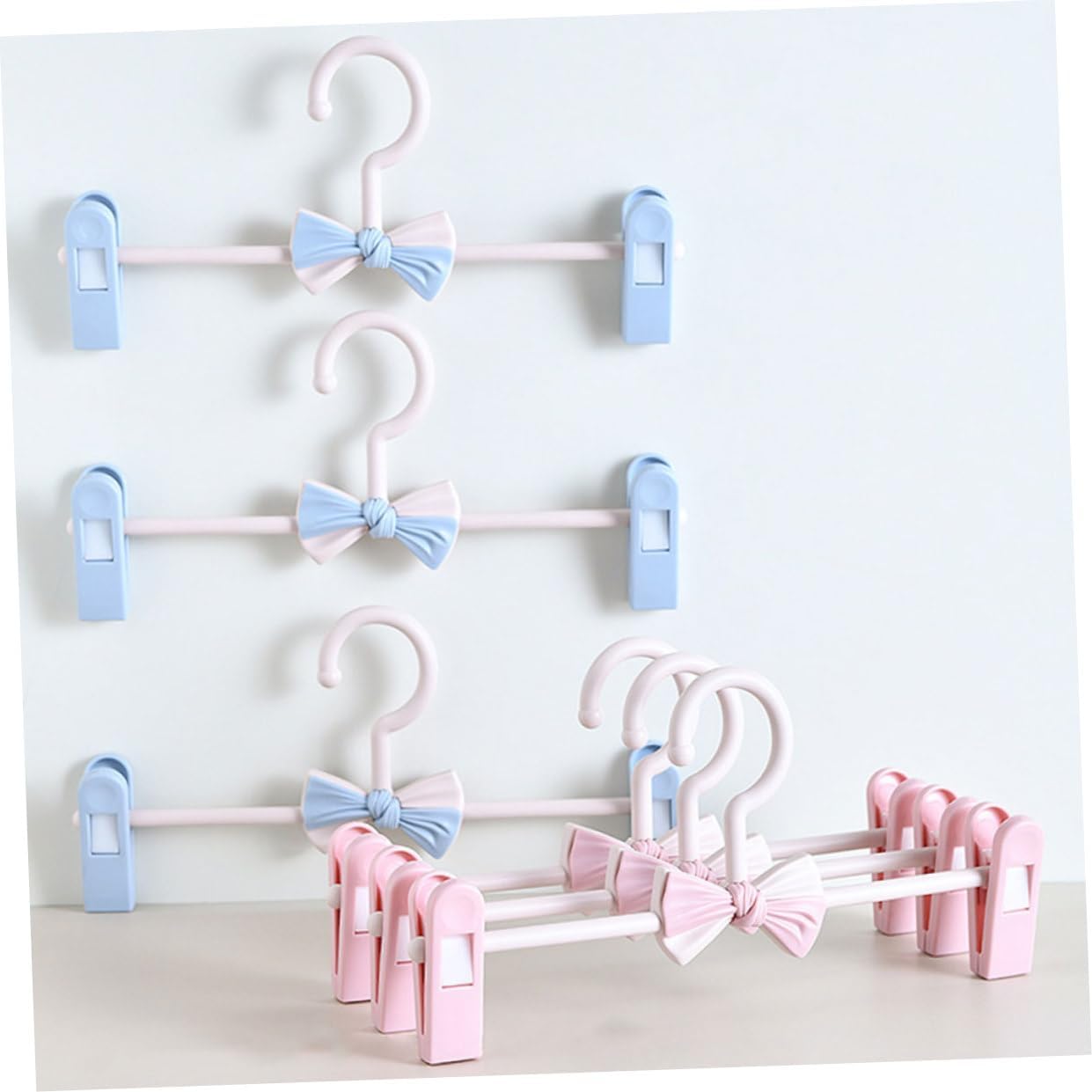 10Pcs Adjustable Skid Skirt Hangers Stretchable Pants Clips Household Plastic Hangers for Clothes and Non Slip Pink