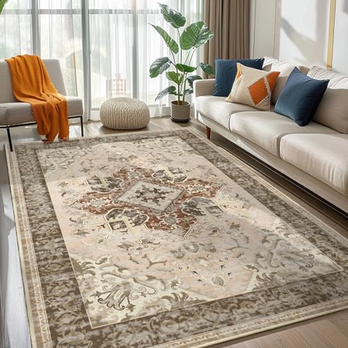 Tapis bohème chic ivoire et orange grand format pour salon dynamique