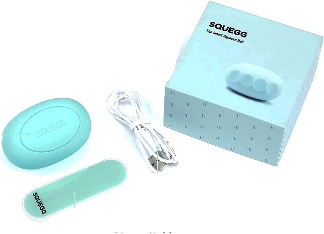 SQUEGG Smart Hand Grip Trainer, charging cable, and packaging box.