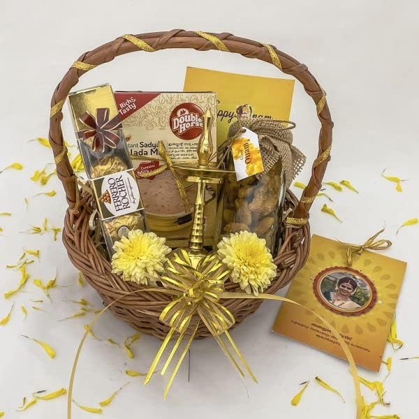 Angroos onam gifts hamper basket with Nilavilakku and jaggery chips, Ferrero Rocher 4 pieces, Payasam Mix, Photo card and greeting card