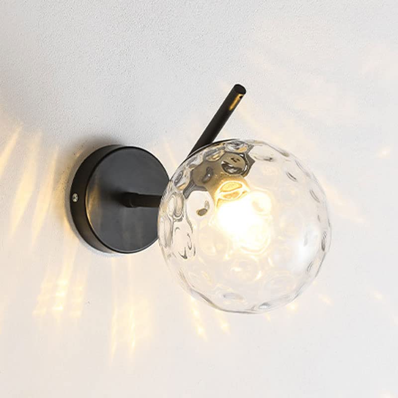 Lámpara de pared de granja industrial con detalles de metal negro y globo de cristal texturizado