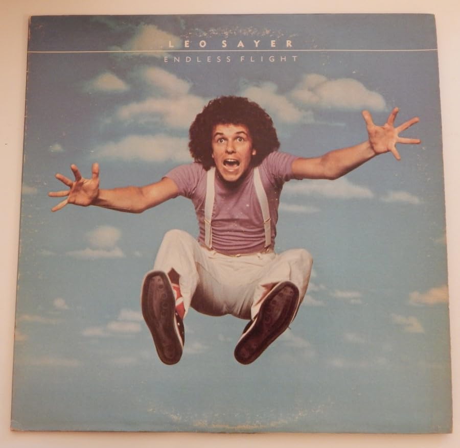 ENDLESS FLIGHT - vinyl lp. HOLD ON TO MY LOVE - YOU MAKE ME FEEL LIKE DANCING - REFLECTIONS - WHEN I NEED YOU, AND OTHERS.      Paperback – January 1, 1976