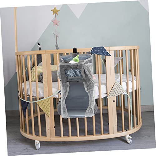 Pochette suspendue pour couches avec grands compartiments pour optimiser le lit bébé