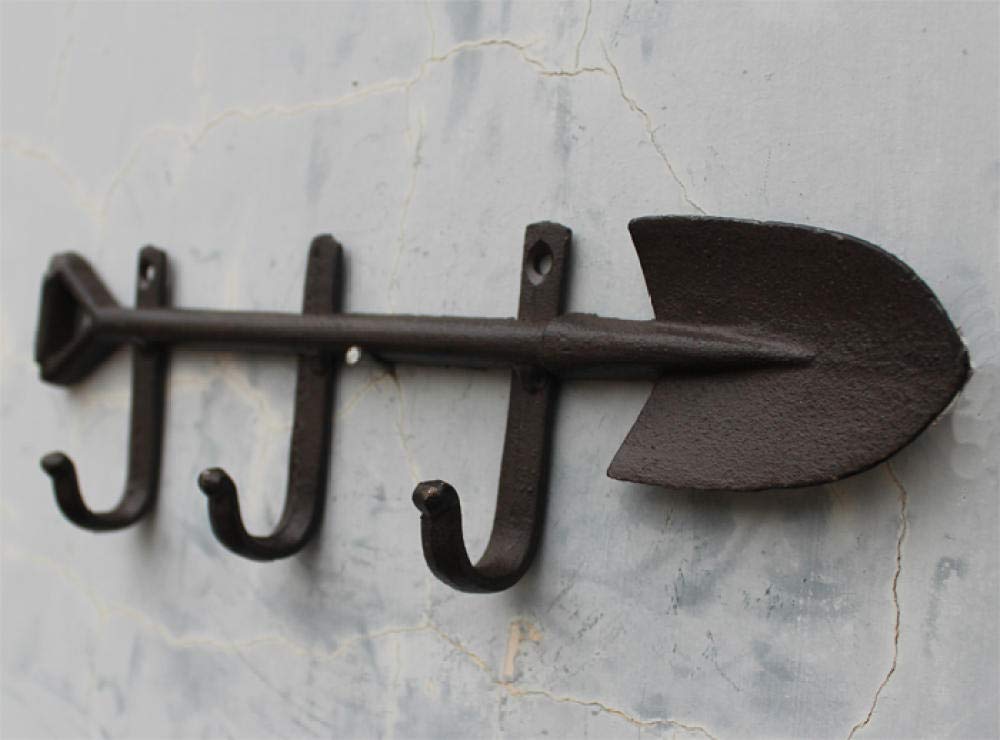Herse de fer et outils en fonte pour aménagement et décoration de la cour