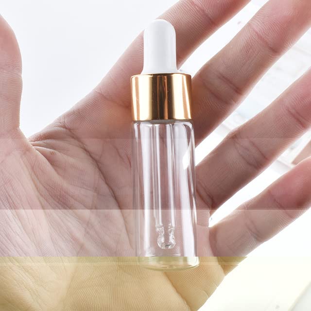 50pcs / lot Frasco cuentagotas de vidrio transparente Aromaterapia Tapa de metal líquido Suero / Pipeta de aceite de masaje básico esencial Botella recargable-5ml, Oro con blanco