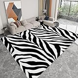 [Ultra Doux - Agréable pour Marcher Pieds Nus] : Fabriqué en fibres imitation flanelle ultra douces et respectueuses de la peau, ce tapis poil court offre un toucher moelleux et confortable. Parfait pour créer un espace cosy, il réduit le bruit et améliore le confort dans les zones de passage fréquent