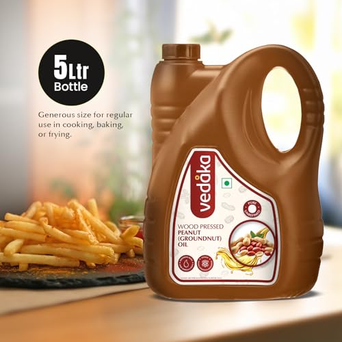 Image of Amazon Brand - Vedaka Wood Pressed Peanut Oil 5L | Cooking Oil | Groundnut Oil | Kolhu, Kacchi Ghani, Mara Chekku, Ganuga | Rich Aroma & Flavour Of Groundnuts