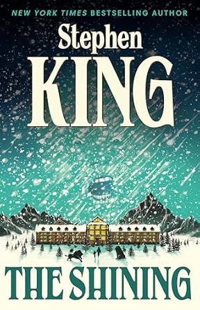 The Shining by Stephen King, book cover features a snowy blizzard pouring down on a hotel in the mountains; there is a screaming face barely seen within the snow in the sky.