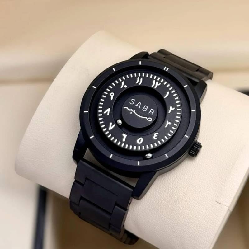 Image of Luxury Men Arabic Dial Black Wrist Watch - Unique Eastern Numerals Design, Minimalist Magnetic Rotating Disc Face, Stainless Steel Band, Unisex Modern Timepiece, Islamic Watch