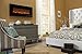 Touchstone 80001 - Onyx Electric Fireplace - (Black) - 50 Inch Wide - Wall Hanging(Not for in-Wall) - Log & Crystal Included - 5 Flame Settings - Realistic Flame - Timer & Remote