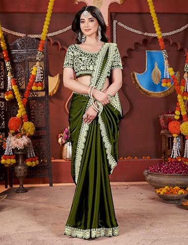Image of DHARMEE Women's Elegant Designer Sarees Premium Rangoli Fabric with Embellished Border, Lightweight and Stylish Ethnic Wear - Perfect for Parties, Weddings, and Festive Occasions..