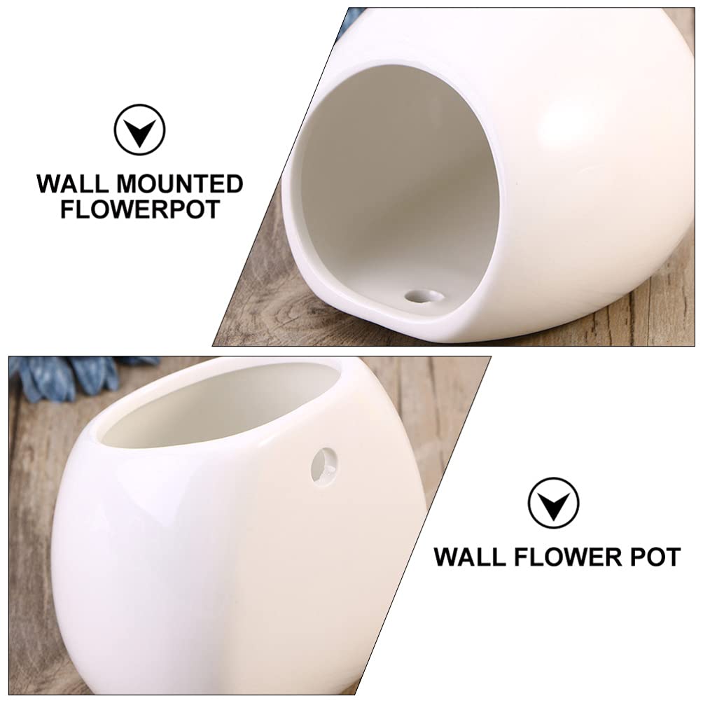 Białe ceramiczne doniczki ścienne, okrągłe wiszące uchwyty na rośliny, mini wazony ścienne do sukulentów, wewnętrzne donice cylindryczne, dekoracyjne dekoracje ścienne.