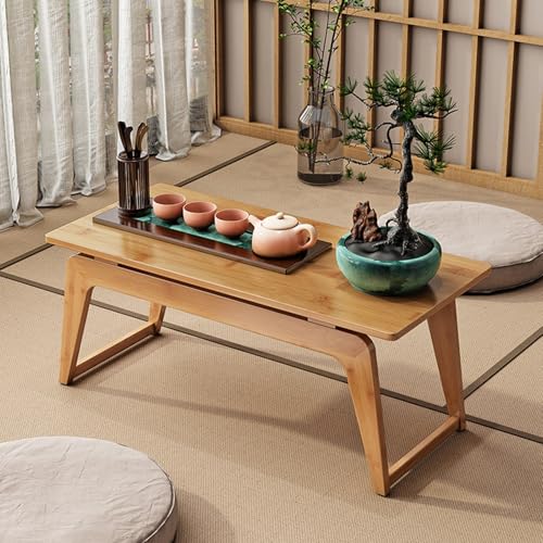 Table basse japonaise pour manger au sol confortablement dans le salon
