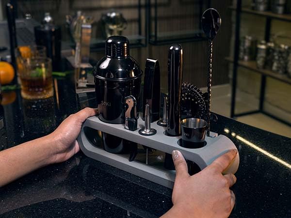 Image of SAKI|10 Piece Bartender kit Black (Cocktail Shaker Gift Set with Gray Stand), Bartender Kit: Shaker, Spoon, Jigger, Muddler, Strainer, Wine & Beer Bottle Opener, Pour Spouts & Tongs (with Colour Box)