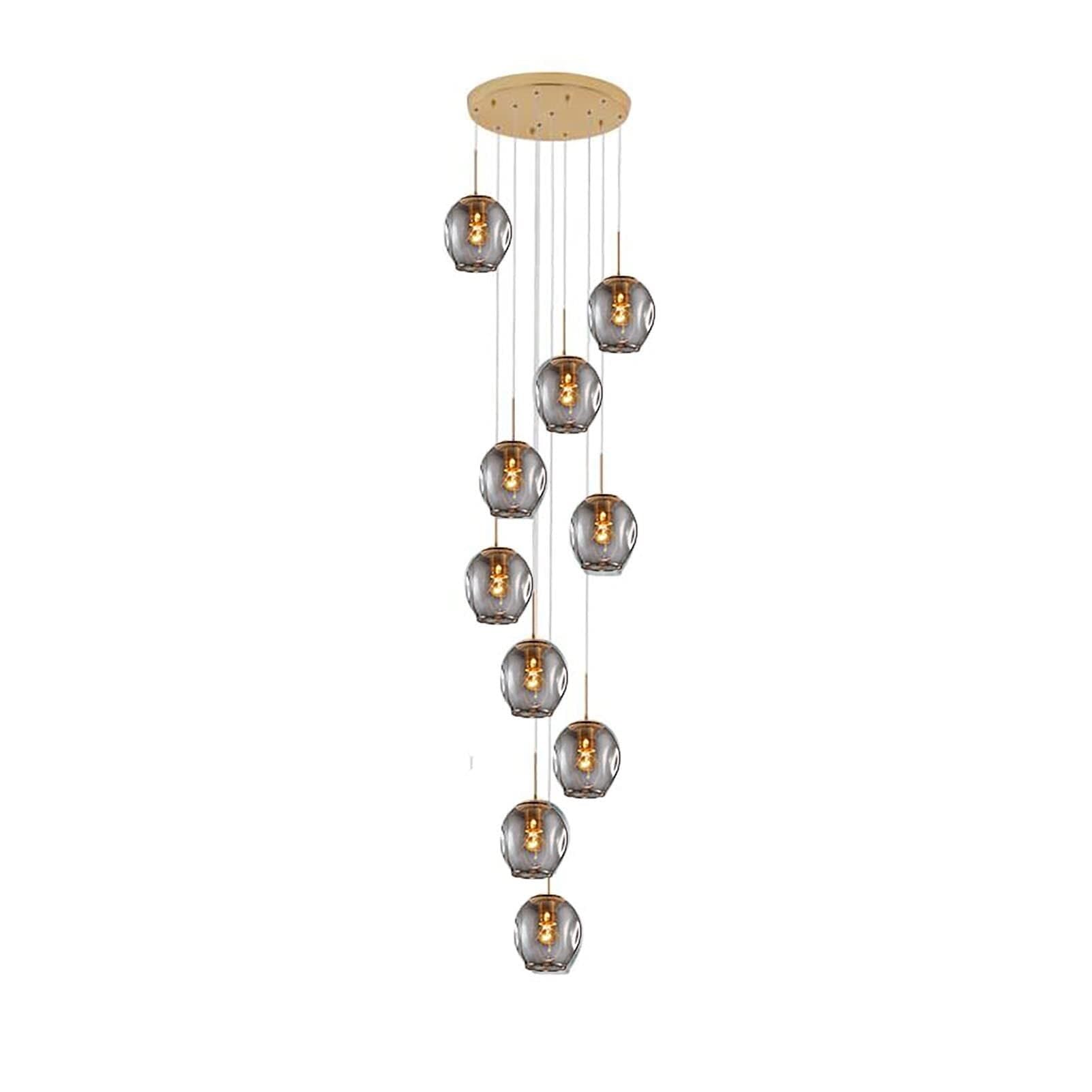 Lustre de plafond haut en cristal pour habiller le vide d'un grand escalier de villa