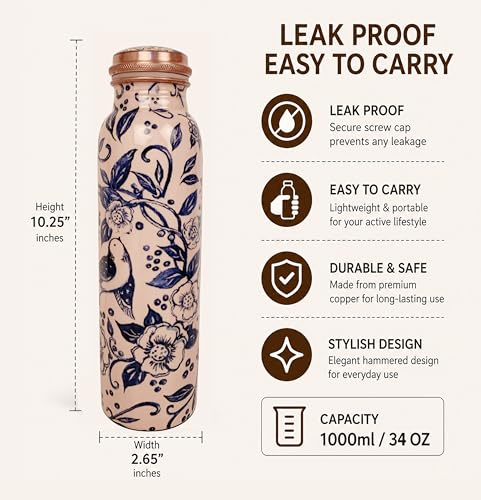 Image of Pure Copper Water Bottle - Handcrafted - Ayurveda health benefits - Large 1000 ml - Leak proof, Easy to carry for Sports, Fitness, Yoga, School- White Base Indigo Blue Floral Textured Enamel
