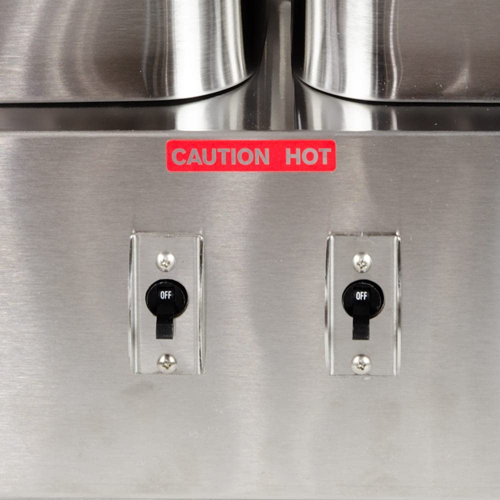 Close-up of power switches and 'CAUTION HOT' label on Star-Max fryer