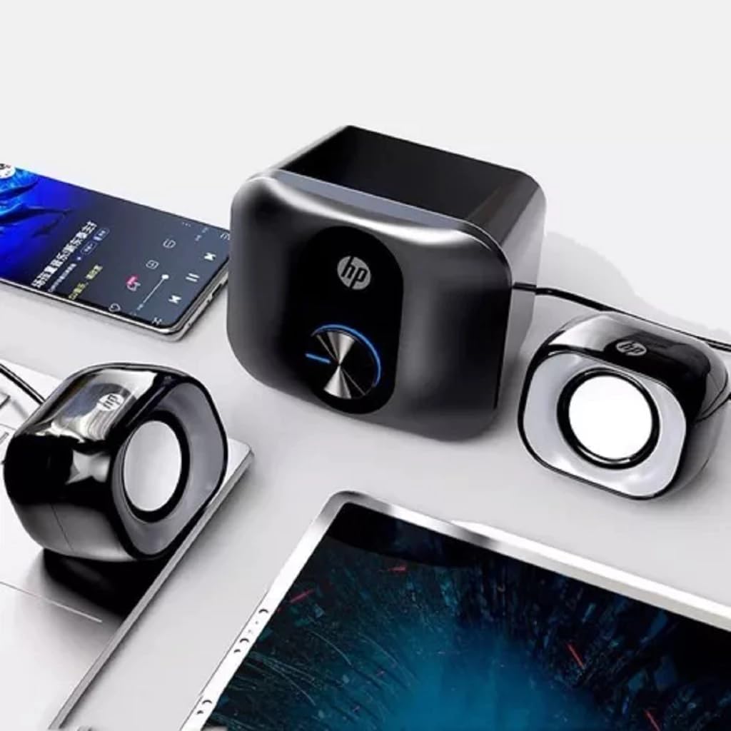 HP Dhs-2111S speakers connected to a laptop and smartphone